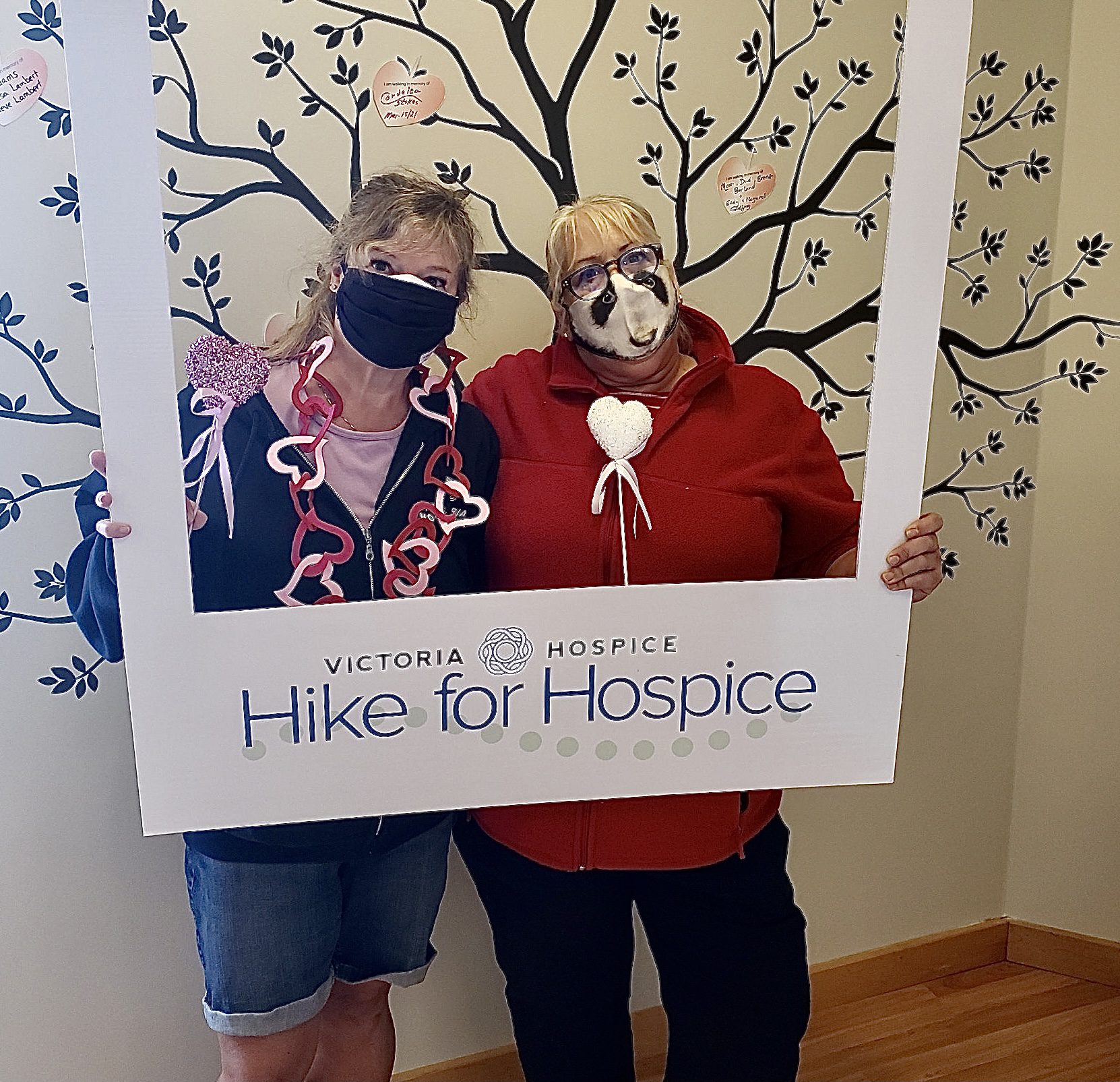 Hospice nurses holding Hike for Hospice photo frame